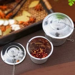 TeaLux 5-Delig RVS Theefilters Set Met Maatlepel En Lekbakjes En Knijper - Theezeef Voor Losse Thee En Kruiden - Tea InfuserStrainer Giftset - Verse Thee FilterZeef Cadeau Pakket - Kruidenbuiltje Ei Met Onderzetters - Geschenkset -Koffie Series Winkel 1200x1200 329